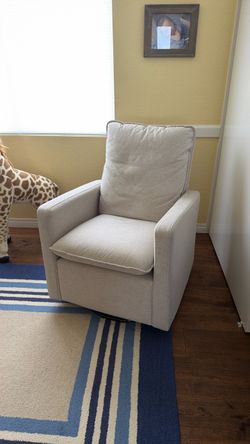 Beige Upholstered Swivel Chair