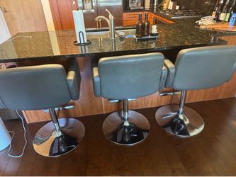 3 gray high chairs