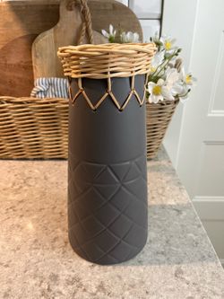 Rattan and ceramic vase $10