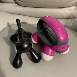 Handheld vibrating massagers