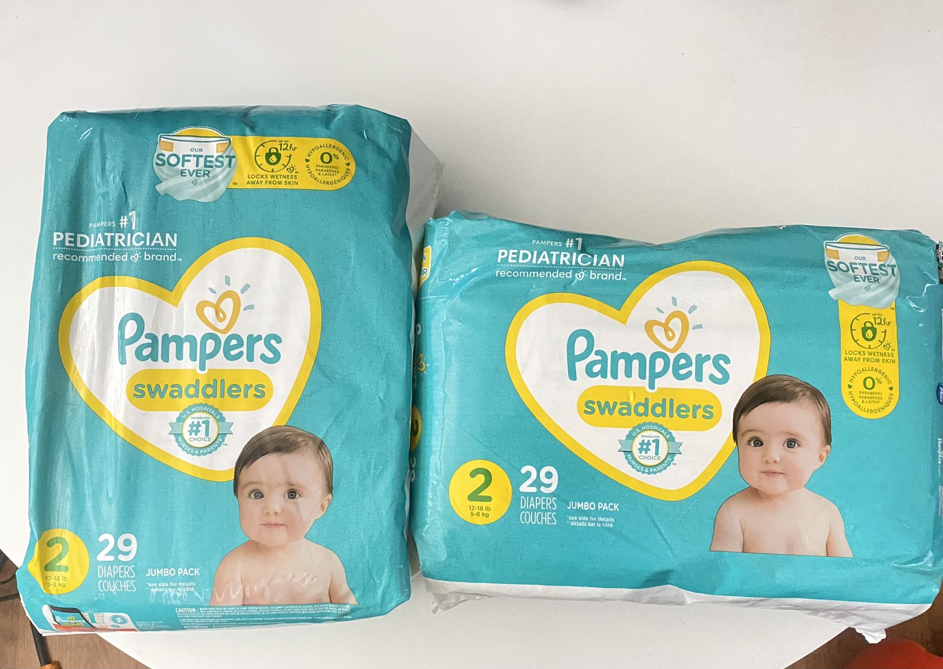 2 Packs Of Pampers Diapers