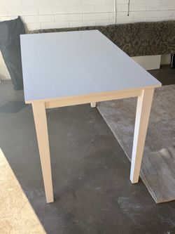 White table L54”xW32”xH36”