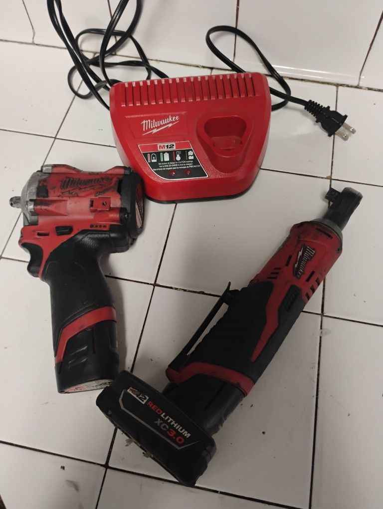 Milwaukee Ratchet And Medium Impact Gun Two Batteries And Charger