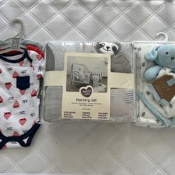 everything is new: a set of bedding for a crib, a blanket, clothes