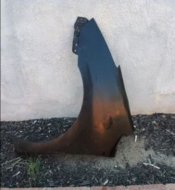 2004 TOYOTA PRIUS LEFT FENDER DRIVER
SIDE GENUINE USED OEM. NCF