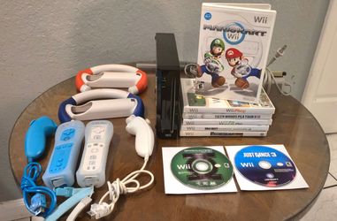 Nintendo Wii Console Bundle. Mario Kart, Racing Wheels, 8 Games. Controllers, Nunchuck Controllers