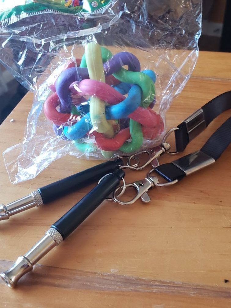 NEW DOG TOY AND 2 DOG WISTLES