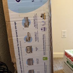 New in box crib