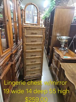 Rattan Lingerie Chest with Mirror We are located at 2811 East Bell road. Another Time Around Furniture.