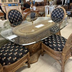 Vintage Italian bamboo dining set with a glass top and 4 chairs  w/ pineapple print cushions. - Excellent Condition-  62” x 42”