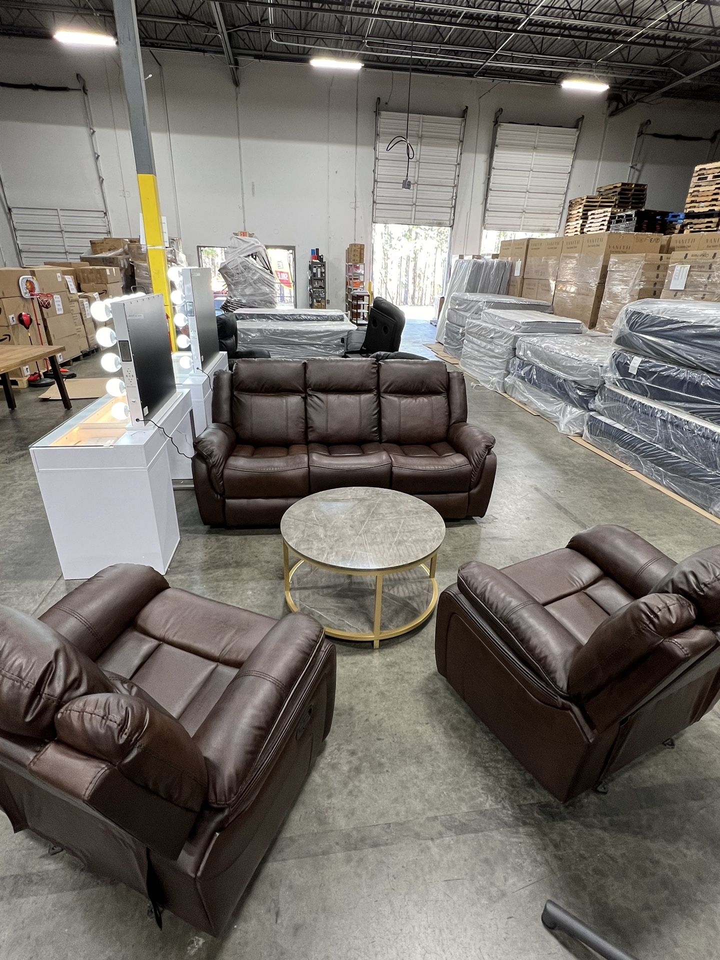 Brown Leather Recliner Couch and 2 Rocking Recliner Chairs