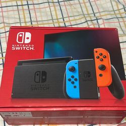 Unopened Nintendo Switch with Neon Blue and Neon Red Joy‑Con