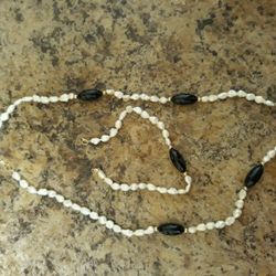 14-karat Gold pieces in between real pearls necklace and bracelet matching set