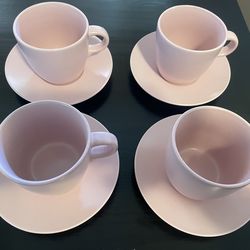 Pink coffee cups with plates creamer cup and sugar