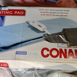 New Heating pad. Never been used. By Conair.