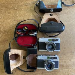 2 Petri 7 Rangefinder 35mm Cameras With Wide Angle And Telephoto Attachments 