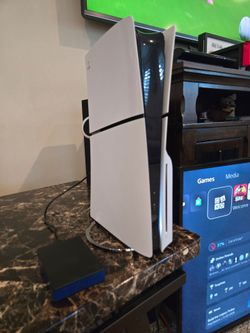 Playstation 5 Slim with 4TB Western Digital M.2 NVMe SSD with 4 controllers and games