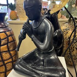 Vintage  chalkware sculpture by Austin Productions, often referred to as a "Buddhist Boy Snake Charmer" with lighted lucite pedestal