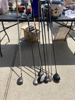 Assorted Golf Clubs. Eight. In Good Shape.