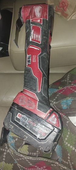 This is a Milwaukee M18 Cordless Multi-Tool, specifically model 2626-20. It is a cordless oscillatin
