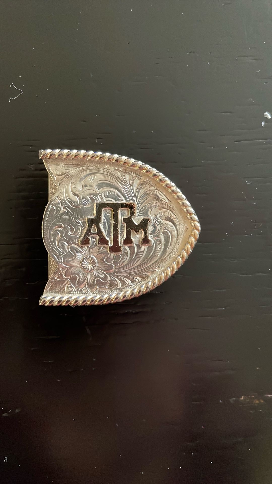 Sterling silver belt tip A&M I believe it’s 1904 date cording to the pass down to me