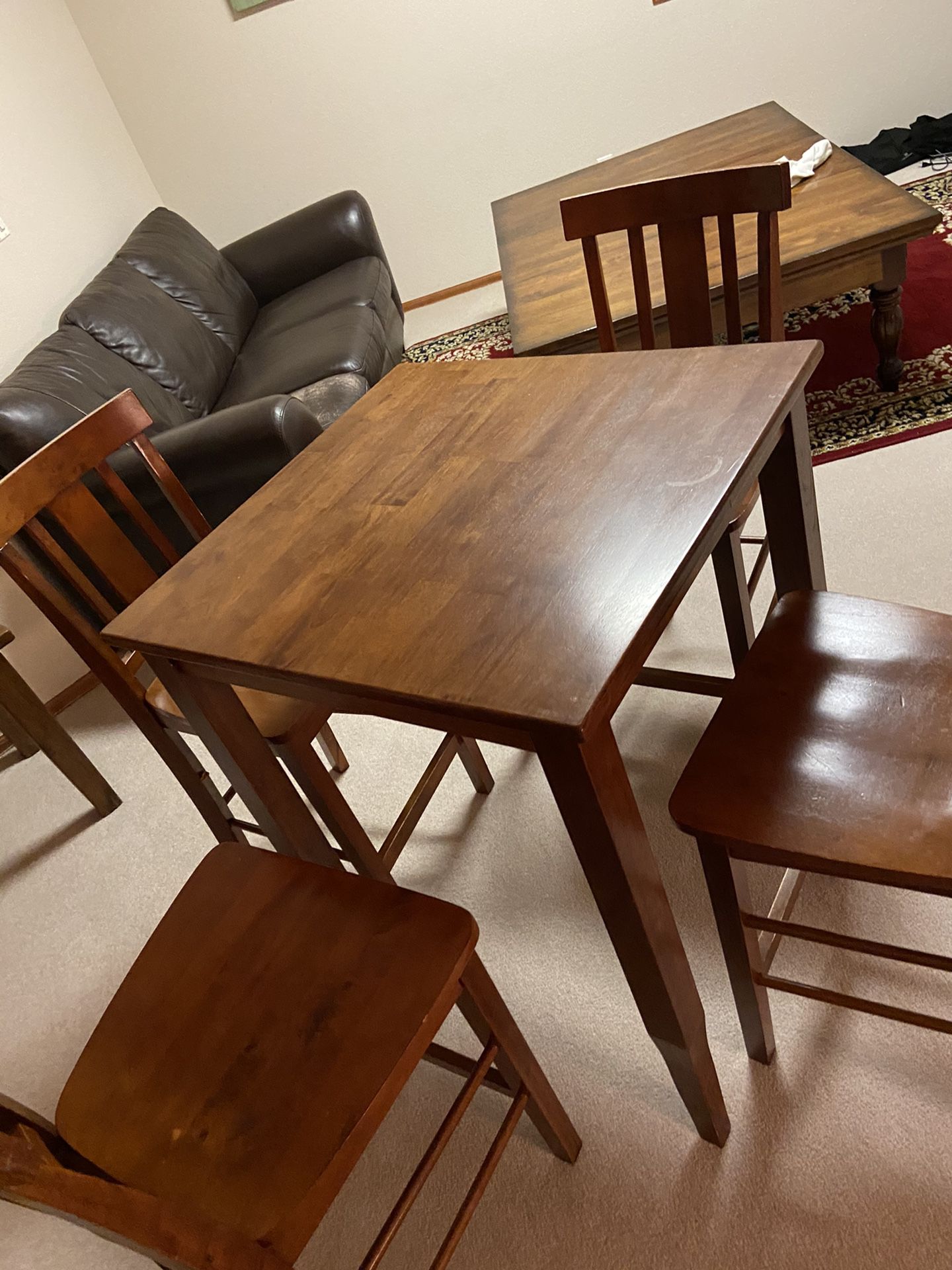 Cute counter height table 30x30x36 with 4 chairs.