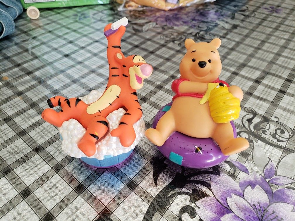 Winni the pooh and tigger water hose sprinkler