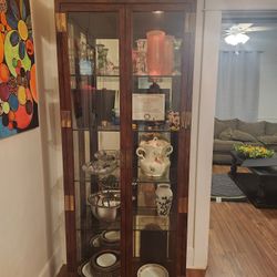 1980s Vintage Henredon Lighted Campaign Cabinet with Mirrors and Beveled Glass
