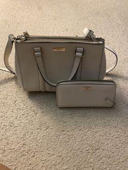 Unique Ivory purse and matching wallet by Kate Spade