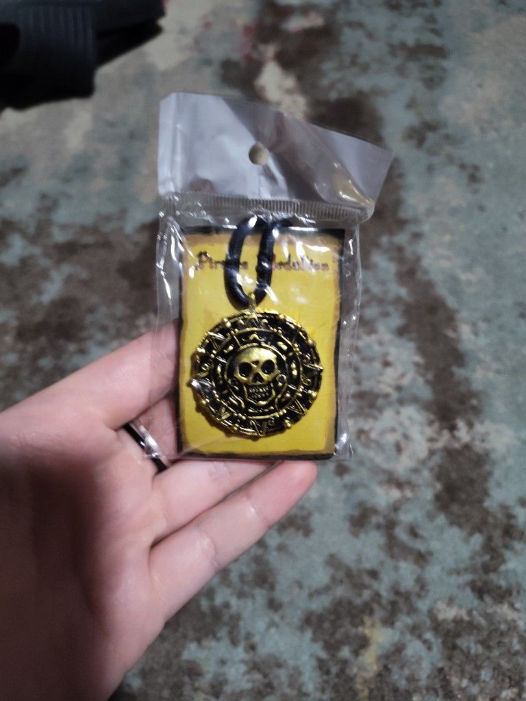 "Pirate Medallion" necklace, gold with black cord