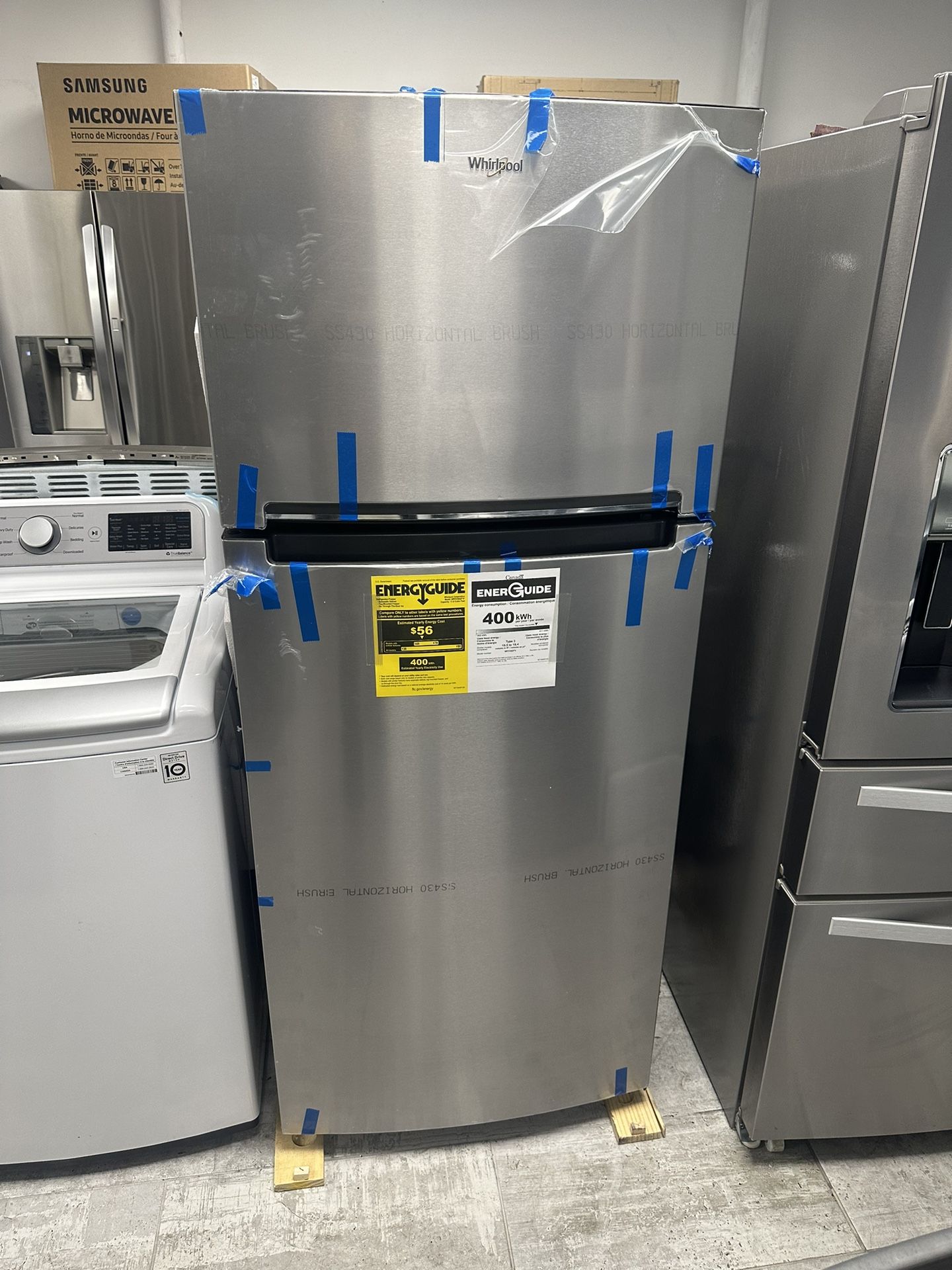 Whirlpool 18-cu.ft Top Freezer Refrigerator In Stainless Steel 