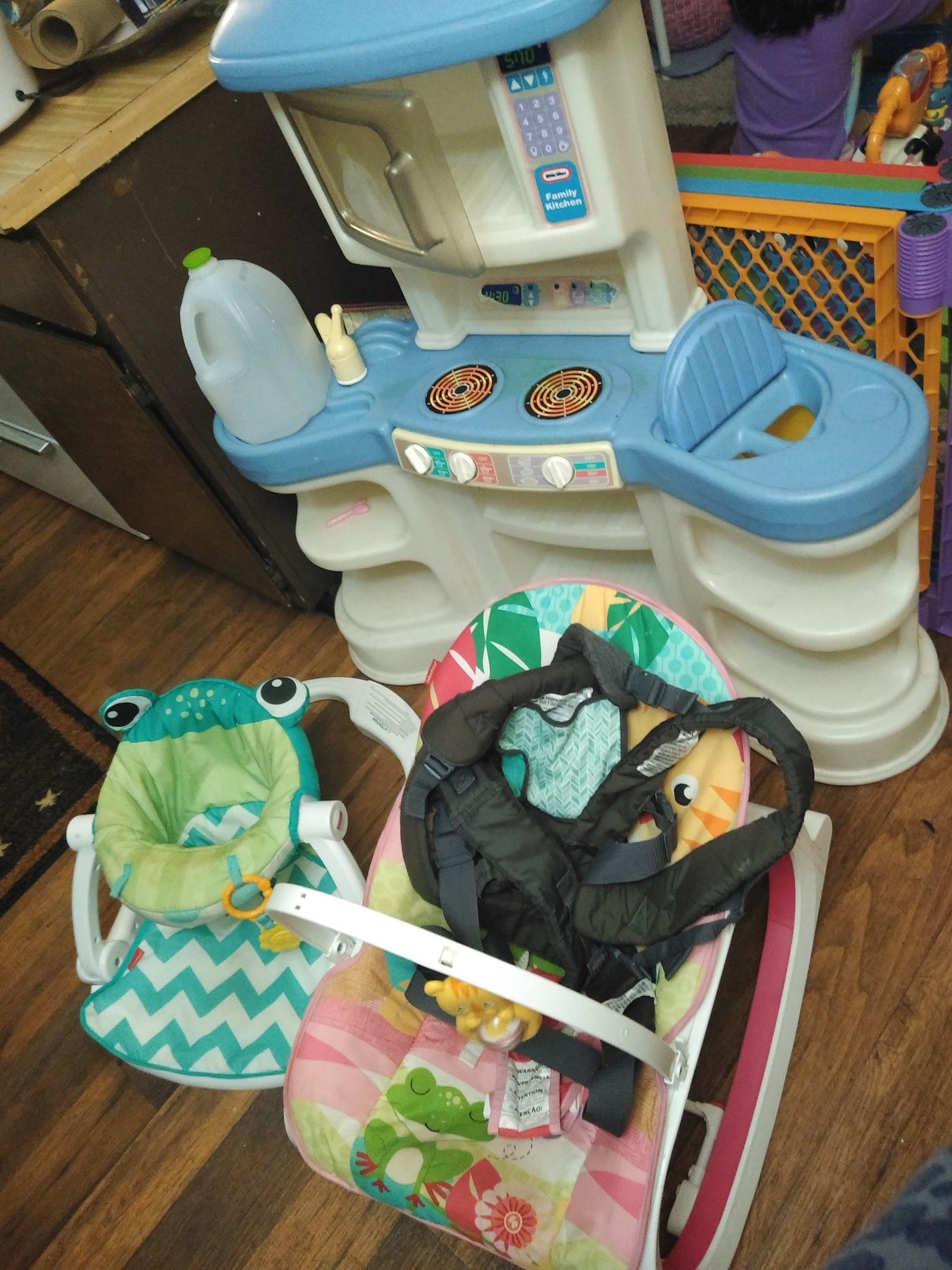 Baby holder and two chairs