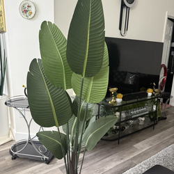 Retty artificial  plant 5 ft tall! Brand new