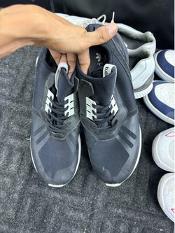 black Adidas Tubular sneakers