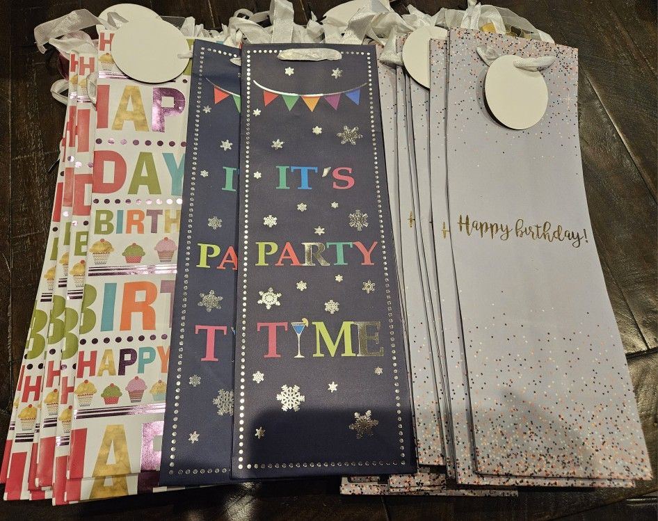 $1 each, 10 wine bottle gift bags $10 several options: birthday/cheer/funny/etc.
