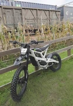 Mini Surron (auto wheelie) $2000