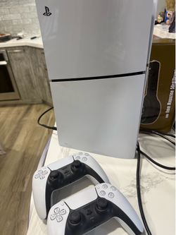 PS5 slim pro with 2 controllers,5 games.