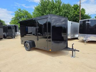 2026 New 6x12 SA Screwless Enclosed Trailer | Blackout | Spoiler Package | .08 Polycor | Barn Doors | 1136

(Black)