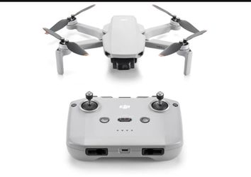 DJI Mini 2 SE Fly More Combo, Mini Drone with 10km Video Transmission, 3 Batteries for 93 Mins Max Flight Time, Under 249 g, QHD Video, Auto Return to