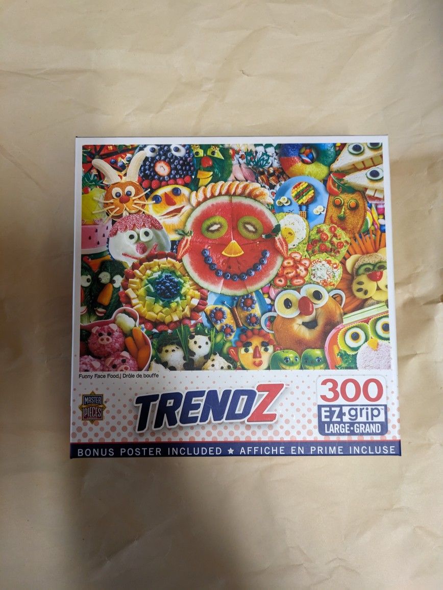 This is the MasterPieces Trendz Funny Face Food 300 EZ-Grip Jigsaw Puzzle.
