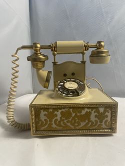 Vintage Deco-Tel Victorian style rotary dial telephone