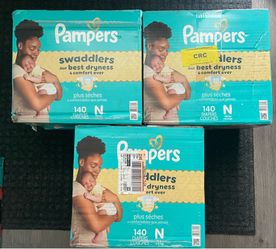 3 new XL boxes of newborn diapers (140 count per box)