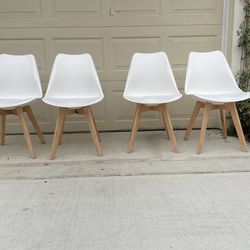 Set of 4 Modern White Chairs with a Mid-Century style see pics for measurements and details 