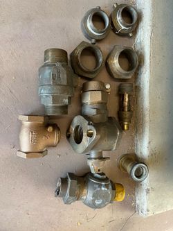 New & used brass 2” & 1-1/2” fittings