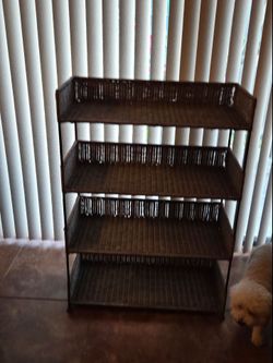 Brown rattan  and metal shelf