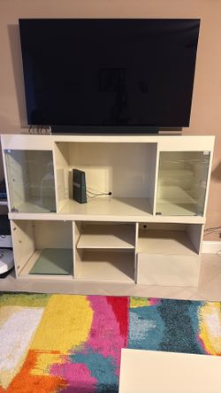 Formica entertainment center with glass shelves & glass doors