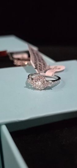 Size 5 Rhodium Plated 925 Sterling Silver .075 CTW VvsD Moissanite Ring.