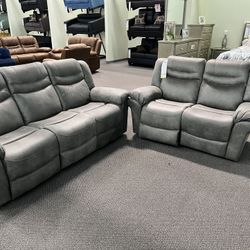 New Reclining Couch / Love Seat . Grey Breathable Leatherette . Free Delivery !