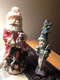 Christmas Santa and Snowman statue's