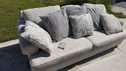 Ashley brand chenille couch with ottoman, good condition, just want the space back